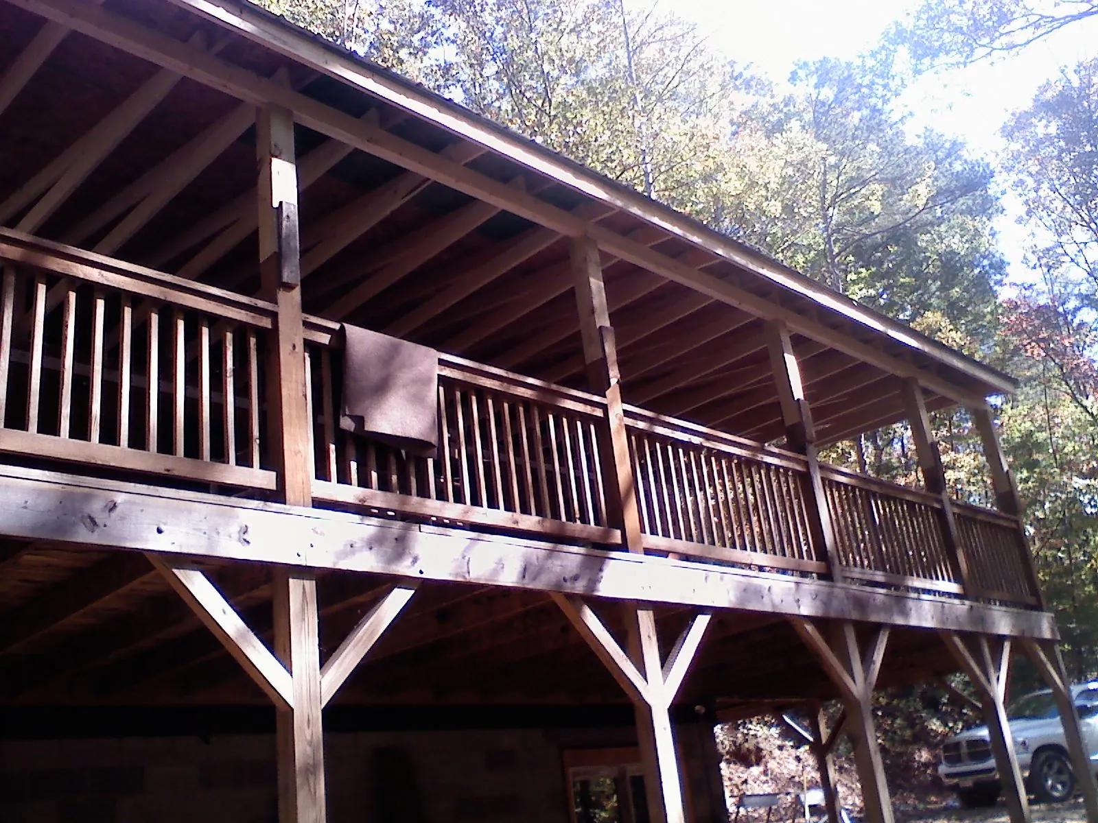 Timber framing under a new elevated porch and deck — Roof Leak Repair in Miamitown by Roofing Brothers